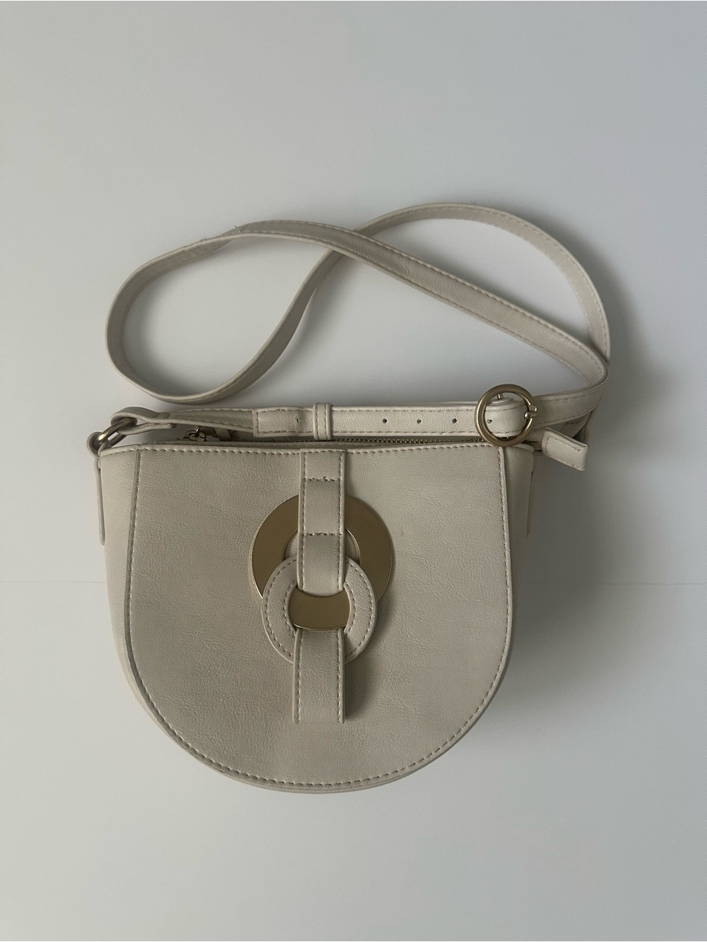Cream Crossbody Saddle Bag with Gold Accent